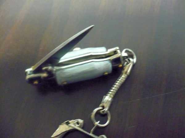 Mini coltello a scatto, italian stiletto - 7 cm imitazione di madreperla - lama classica, pugnale artigianale Maniago Italia