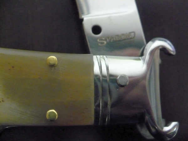 Famiglia Spadon - stiletto  calibro /20 - bufalo chiaro / buffalo light - taglio classico clip point - 1