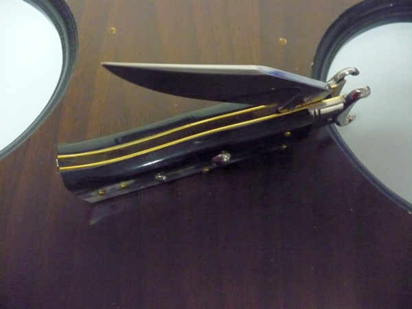 Famiglia Spadon - stiletto  calibro /20 - bufalo brasiliano - taglio classico clip point - 10