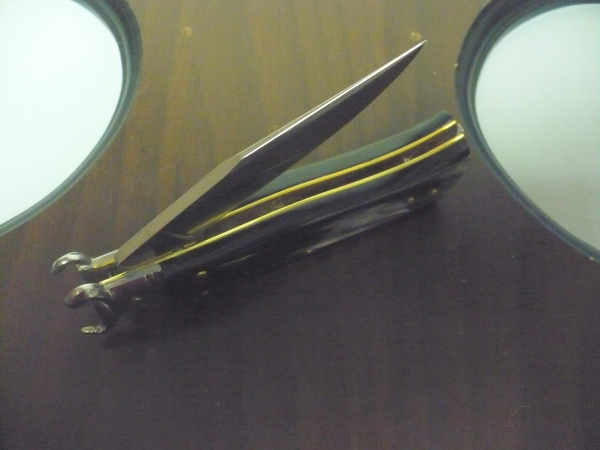 Famiglia Spadon - stiletto  calibro /20 - bufalo brasiliano - taglio classico clip point - 10