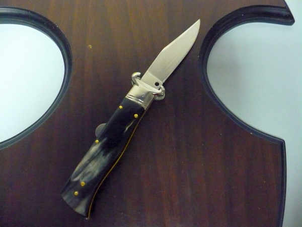 Famiglia Spadon - stiletto  calibro /20 - bufalo brasiliano - taglio classico clip point - 10