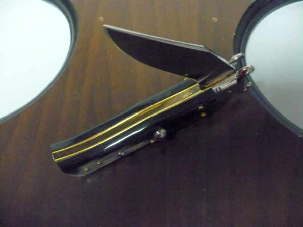 Famiglia Spadon - stiletto  calibro /20 - bufalo brasiliano - taglio classico clip point - 9