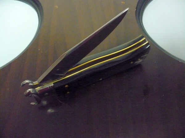 Famiglia Spadon - stiletto  calibro /20 - bufalo brasiliano - taglio classico clip point - 12