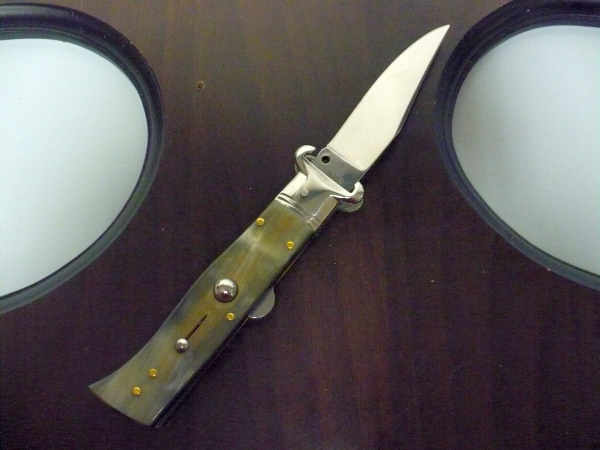 Famiglia Spadon - stiletto  calibro /20 - bufalo brasiliano - taglio classico clip point - 12