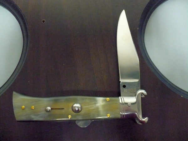 Famiglia Spadon - stiletto  calibro /20 - bufalo brasiliano - taglio classico clip point - 12