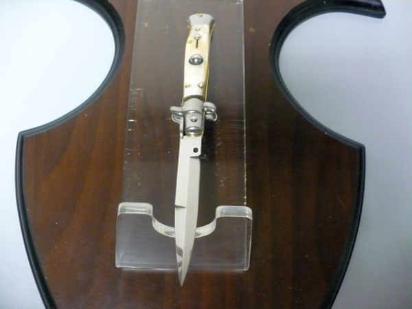 Frank Beltrame Italian stiletto knife with a pale buffalo horn handle, polished metal fittings and pointed blade