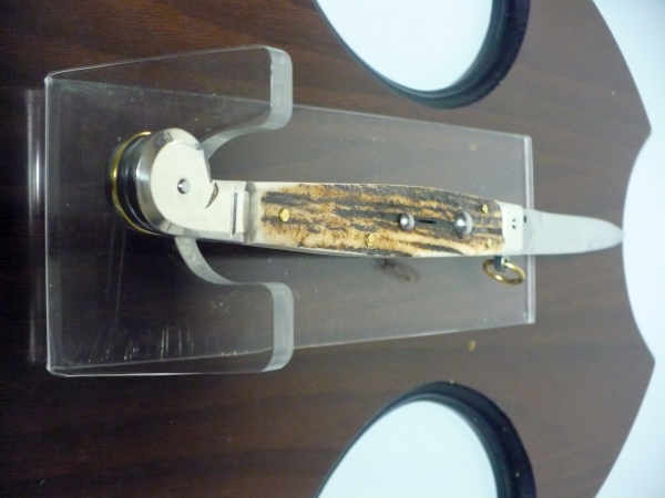 Siciliano A.G.A. Campolin stiletto knife with pale deer horn handle, brass accents, and a narrow pointed steel blade